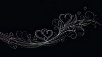 Elegant heart swirls with decorative flourishes on dark background for romantic designs, wedding invitations, Valentine's Day cards and love-themed projects.