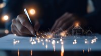 Architect drawing house sketches on paper with magical glowing effect and sparkles, conceptual real estate planning and architectural design visualization at night.