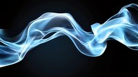 Ethereal blue smoke waves flowing horizontally against black background create mesmerizing abstract pattern for luxury product advertising and design projects.