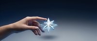 Caucasian woman's hand holding glowing white star symbol against dark blue background, representing success, achievement, excellence, and aspirational goals for business and motivation concepts.