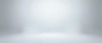 Empty studio backdrop with soft diffused lighting and neutral gray tones, suitable for product photography, portraits, and commercial advertising applications.