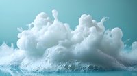 Ethereal white foam bubbles and clouds against turquoise background create dreamy atmospheric composition with soft textures and delicate light effects.