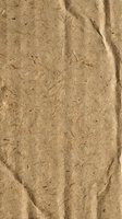Natural brown recycled paper texture with organic fibers and rough surface for eco-friendly design projects and sustainable packaging materials.