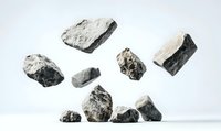 Rough gray stones floating in air against white background, creating dynamic composition with shadows beneath. Isolated objects for design and advertising use.