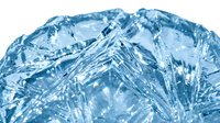Frozen water crystals forming sharp, angular ice formations with translucent blue tones, isolated on white background for design and overlay use.