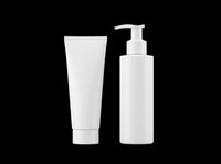 Blank white cosmetic bottles isolated on transparent background, ready for branding and design use on product packaging, labels, t-shirts, and print-on-demand applications.