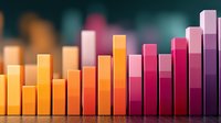 Colorful ascending bar graph showing gradient progression from warm orange to deep purple tones against dark background, representing business growth and analytics.
