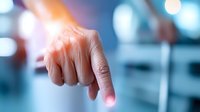 Close-up of finger pressing invisible button with blue bokeh background, futuristic technology concept showing digital interaction and touchscreen interface.