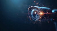 Digital security shield with scanning lens and glowing particles on dark background, representing cybersecurity and data protection technology.