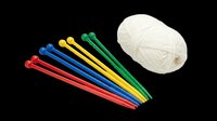 Knitting needles in assorted colors with white yarn ball isolated on transparent background. Ready for crafting, DIY, and design projects including t-shirts, stickers, and print-on-demand products.