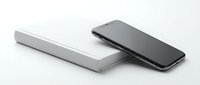 Modern white power bank and black smartphone on clean background for technology and mobile device charging concepts.