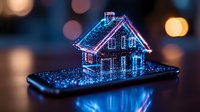 Glowing holographic house model floating above smartphone screen with neon blue and pink lights against dark background with bokeh effect. For real estate technology concept.