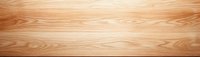 Natural wood grain texture on light brown wooden surface with distinctive swirling patterns and warm tones, suitable for interior design backgrounds and furniture projects.