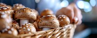 Fresh brown mushrooms with sesame seeds in woven basket against blurred background with bokeh lights, macro food photography for restaurant menu.