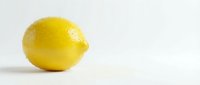 Fresh yellow lemon fruit isolated on white background for healthy cooking, citrus recipes, natural vitamin C supplement and organic food design.