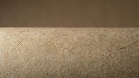 Close-up macro view of human skin texture showing natural pores, fine lines and surface details in warm lighting for medical or skincare applications.