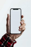 Male hand holding modern smartphone with blank white screen mockup for app presentation and digital marketing campaigns.