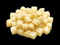 Diced potatoes isolated on transparent background, ready for culinary design, recipe graphics, food packaging, cooking blogs, restaurant menus, and print-on-demand kitchen products.