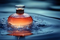 Elegant perfume bottle with pink liquid creating ripples in water, dramatic splash photography with water drops against dark blue background.