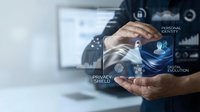 Businessman holding digital security interface with privacy shield and identity protection icons, representing cybersecurity and data protection solutions for enterprise networks.