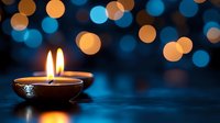 Traditional oil lamp with glowing flame against blue and golden bokeh lights background creating warm festive atmosphere for celebrations and holidays.