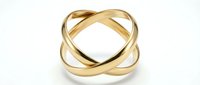 Golden metallic infinity knot sculpture with intertwined loops creating elegant abstract form on white background for luxury design and decoration.
