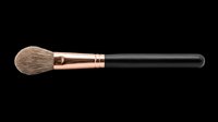 Makeup brush with natural bristles, rose gold ferrule, and black handle isolated on transparent background. Ready for beauty product design, tutorials, and print-on-demand applications.