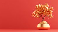 Golden money tree with coins in copper pot against coral red background, symbolizing wealth, prosperity and financial growth. Minimalist feng shui concept.