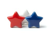 Red, white and blue stars isolated on white background, suitable for patriotic designs, Fourth of July graphics, election campaigns and promotional materials.