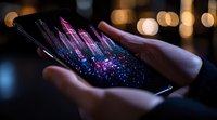 Glowing digital cityscape emerging from smartphone screen with sparkles and light particles against dark background, creating futuristic urban visualization.