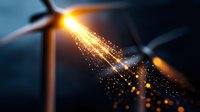 Wind turbine with glowing golden light particles trailing from blade against dark blue background, symbolizing renewable energy innovation.