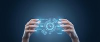 Hands holding digital clock interface with connected technology icons on blue background for time management and business solutions.