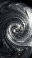 Abstract black swirl pattern with metallic silver highlights creating hypnotic spiral motion for modern design backgrounds and artistic projects.