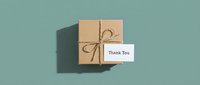 Kraft paper gift box tied with twine bow and a Thank You card on a muted teal background, top view flat lay style.