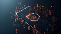 Glowing hexagonal symbol on dark smartphone screen with orange bokeh light effects and digital particles creating futuristic technology atmosphere.