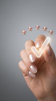 Hand with glowing checkmark selecting five copper stars representing customer satisfaction rating and quality evaluation for business reviews.