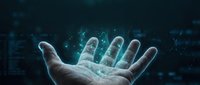 Open palm hand reaching toward glowing digital particles and light effects against dark background for technology and innovation concepts.