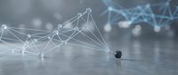 Abstract network visualization with interconnected nodes and lines forming a digital mesh structure on reflective surface, representing data connectivity and technology concepts.