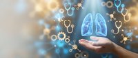 Hand holding glowing lungs with floating stethoscopes on bokeh background for healthcare and respiratory medicine concepts.