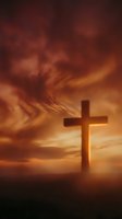 Dramatic cross silhouette against fiery orange sunset sky with swirling clouds for spiritual and religious themes.