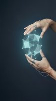 Female hands with henna tattoos protecting glowing geometric network sphere representing digital security and data protection concepts.