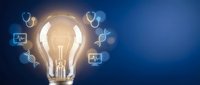 Glowing light bulb with medical icons and DNA symbols representing healthcare innovation and biotechnology solutions for modern medicine industry.
