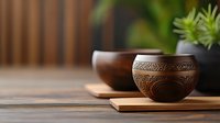 Handcrafted wooden bowls with intricate carved patterns on rustic table, natural kitchen decor and artisan craftsmanship for dining and serving.