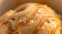 Creamy peanut butter spread with rich, smooth texture and glossy finish, ideal for food photography, culinary content, and nutritional product marketing.