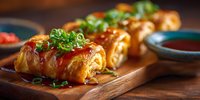 Delicious stuffed cabbage rolls with meat filling garnished with fresh herbs on wooden board, traditional comfort food recipe for home cooking and dining.