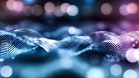 Abstract flowing wave lines with bokeh lights creating dynamic digital energy pattern for modern technology backgrounds.