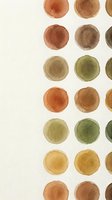 Watercolor circles in earth tones arranged in rows on light background. Hand painted dots in brown, green, orange and yellow hues for artistic projects.