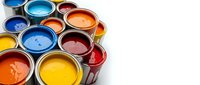 Colorful paint cans with vibrant liquid paints in metal containers for home renovation, artistic projects, and interior design work.