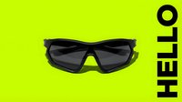 Sport sunglasses with dark lenses on bright neon green background with bold black HELLO text, modern athletic eyewear concept for fashion and lifestyle.