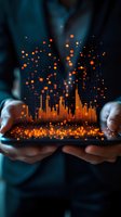 Glowing orange data visualization rises from smartphone screen with sparkling particles, held by hands in dark environment, representing digital analytics and market trends.